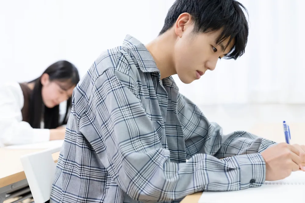 Du học sinh tươi cười trong lễ tốt nghiệp